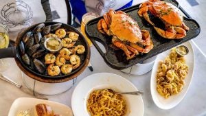 crabs, onion rings, pasta, seafood dishes